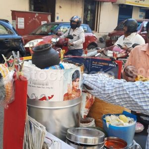 Vendor selling bhelpuri snacks near A1 Wafer Co.