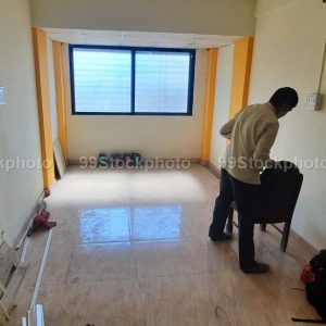 Wiremen preparing to commence electric work in a office